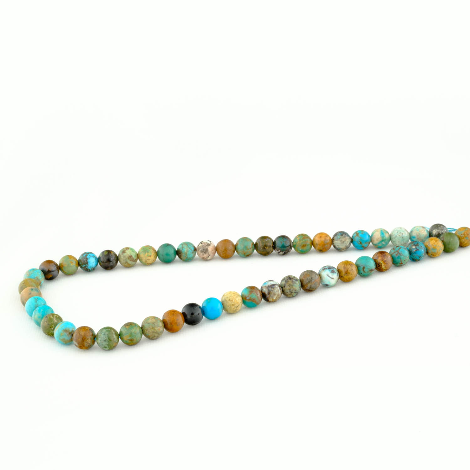 iranian-turquoise-natural-stone-bead-8mm-in-box-promoting-spiritual-growth-and-emotional-balance-your-gemstone.jpg Display of an AA Quality Iranian Turquoise Natural Stone Bead (8mm), emphasizing its healing and protective properties, perfect for enhancing creativity, emotional healing, and communication.