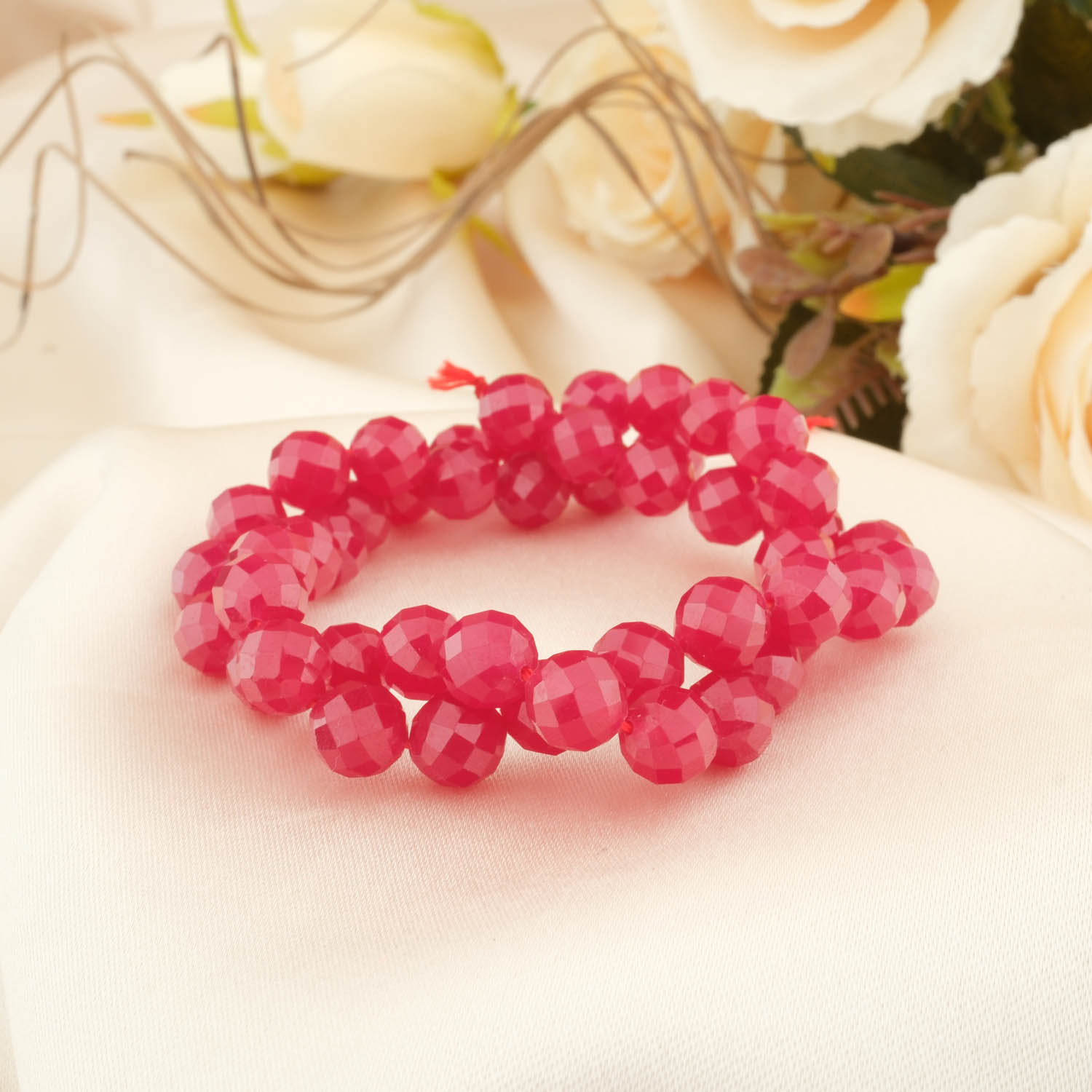 ruby-faceted-natural-stone-bead-8mm-front-view-love-and-passion-your-gemstone-collection.jpg Display of a Ruby Faceted Natural Stone Bead (8mm), emphasizing its creative inspiration, emotional balance, and alignment with zodiac signs like Leo, Aries, Cancer, and Sagittarius.