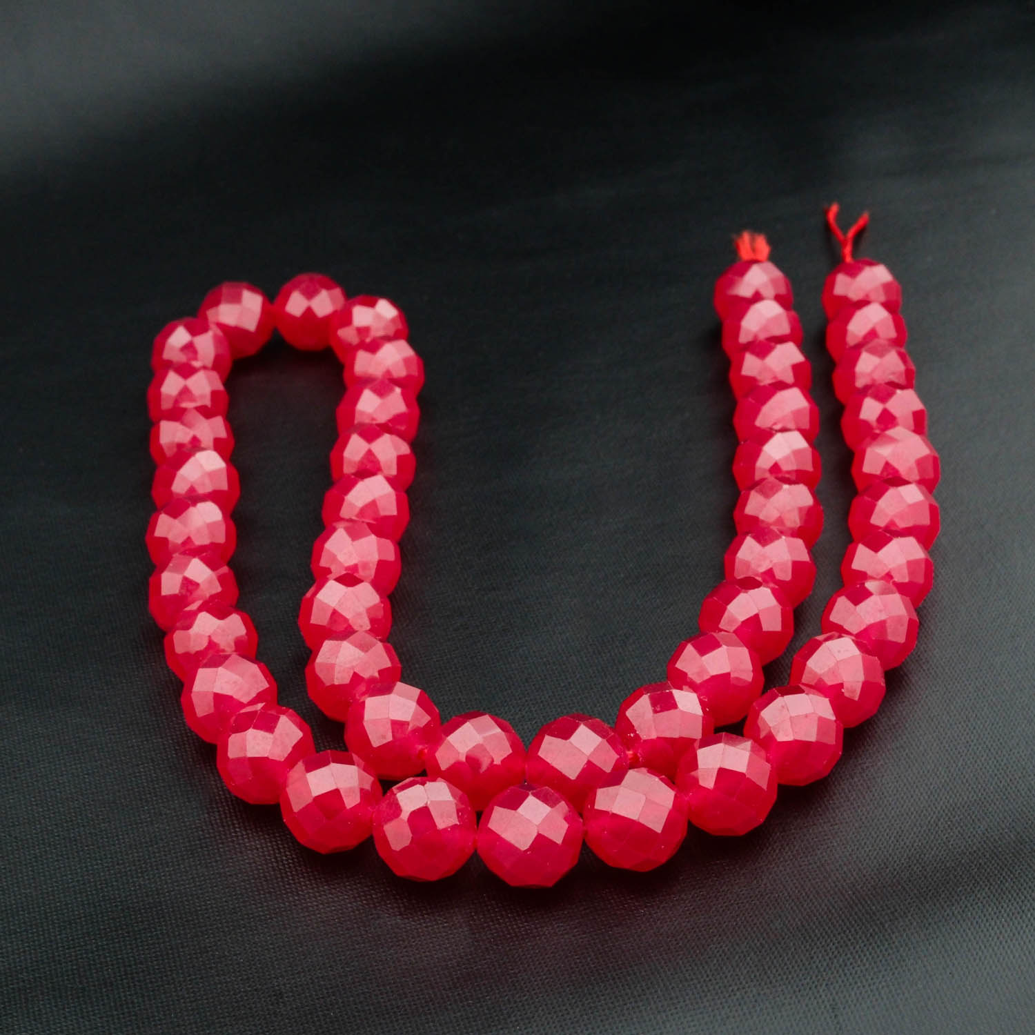 ruby-faceted-natural-stone-bead-8mm-in-box-confidence-and-passion-your-gemstone.jpg A high-quality Ruby Faceted Natural Stone Bead (8mm) displayed in a jewelry box, symbolizing confidence, passion, and a powerful addition to your gemstone collection.