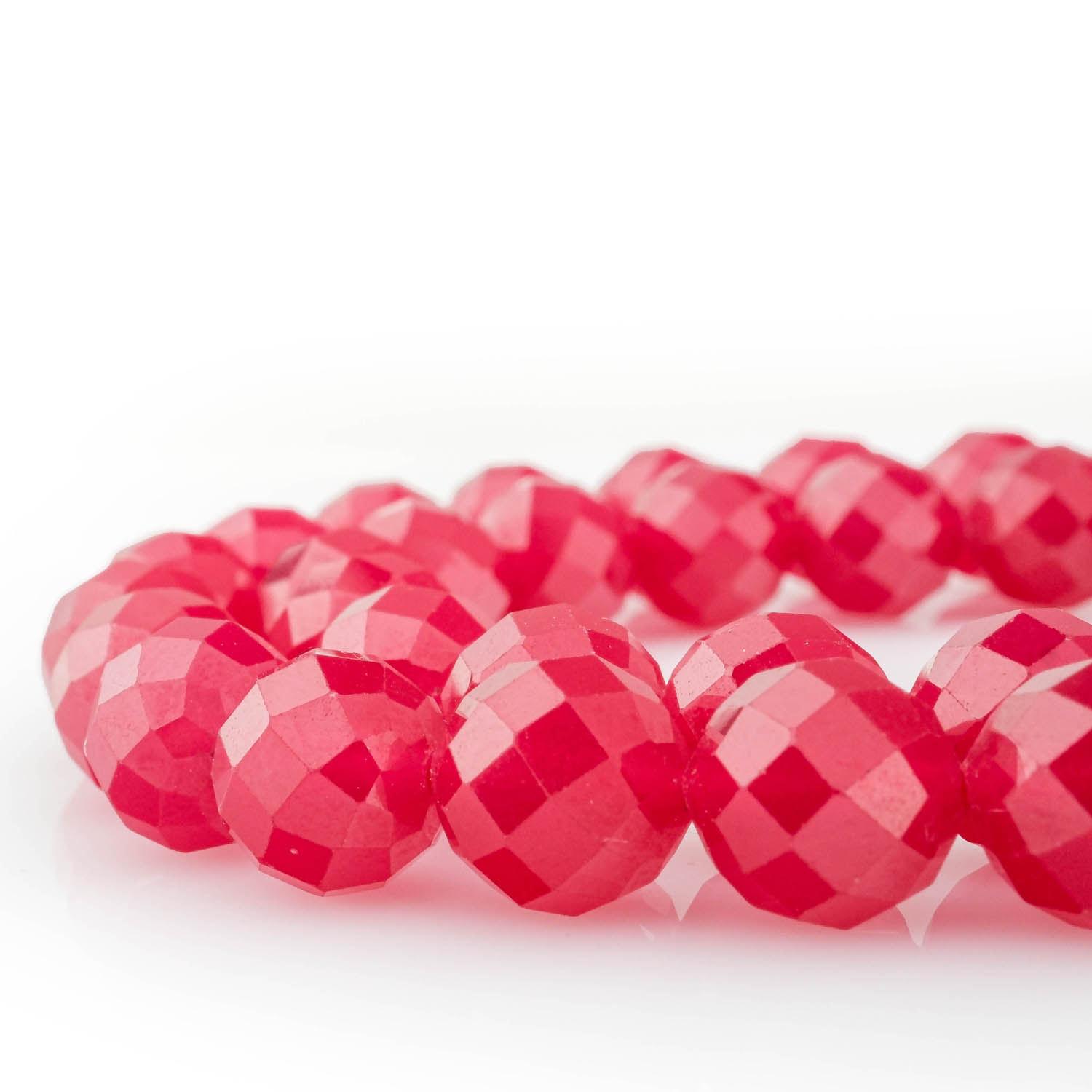 top-view-ruby-faceted-natural-stone-bead-8mm-chakra-alignment-and-courage-your-gemstone.jpg Close-up of a Ruby Faceted Natural Stone Bead (8mm), highlighting its benefits for enhanced focus, protection, and spiritual connection, ideal for enhancing meditation and prayer practices.