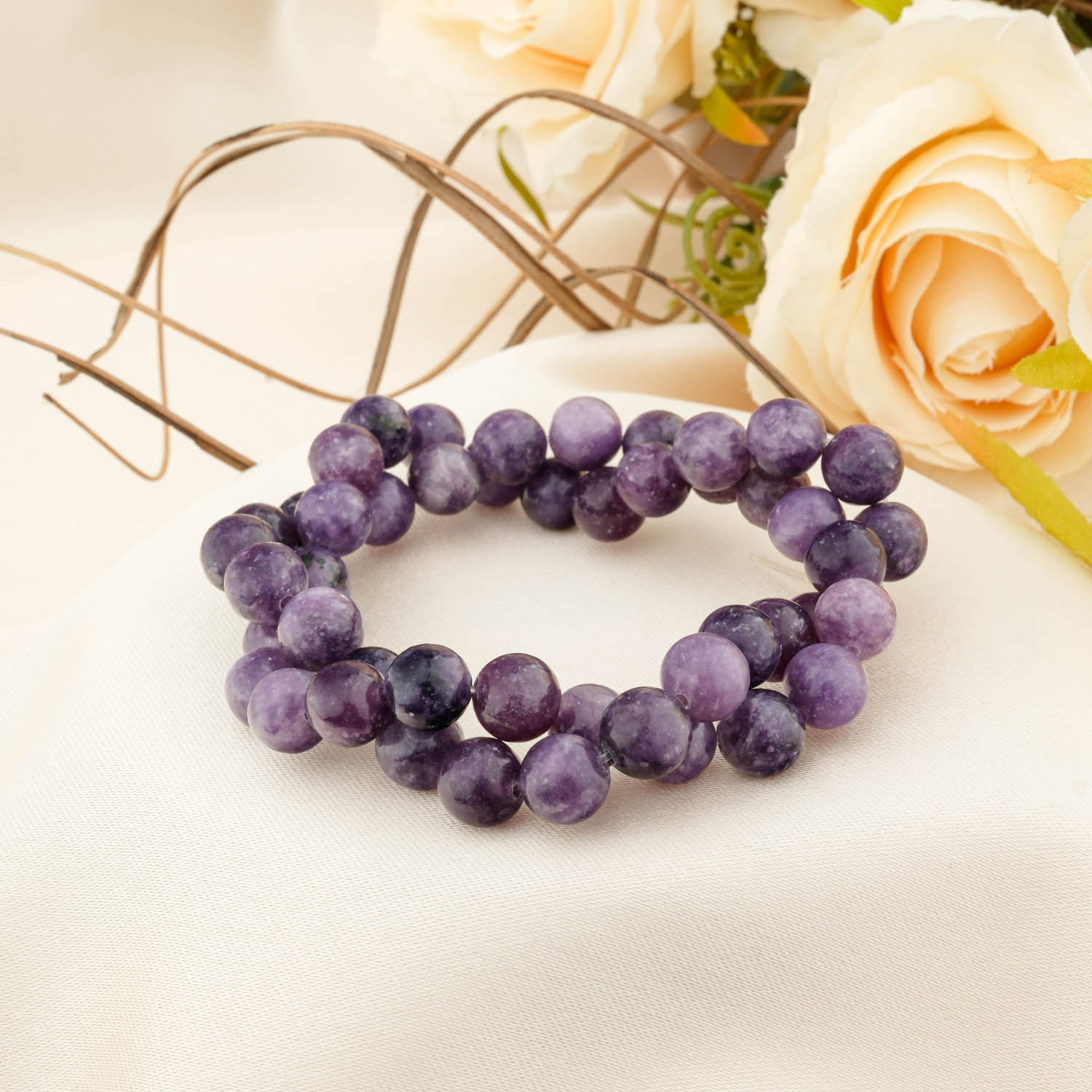 lepidolite-natural-stone-bead-8mm-front-view-calming-energy-and-emotional-balance-your-gemstone.jpg Top view of Lepidolite Natural Stone Bead (8mm), aligned with zodiac signs Pisces, Virgo, Libra, and Cancer, offering intuition and uplifting energy.