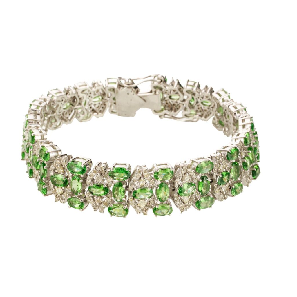 Top view showing full row of tsavorite garnet and diamond clusters.