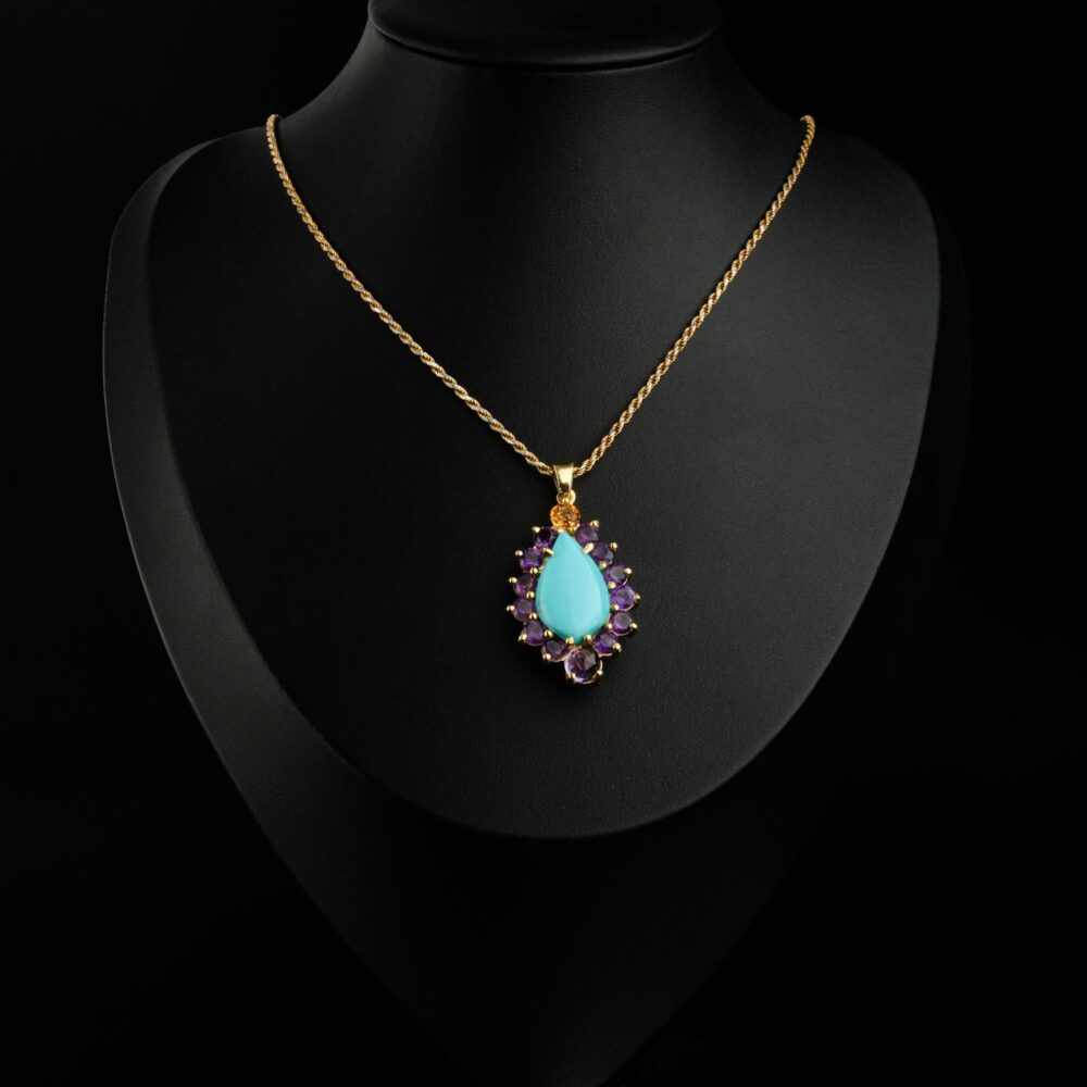 Backside of pendant and 925 sterling silver gold-plated clasp detail.