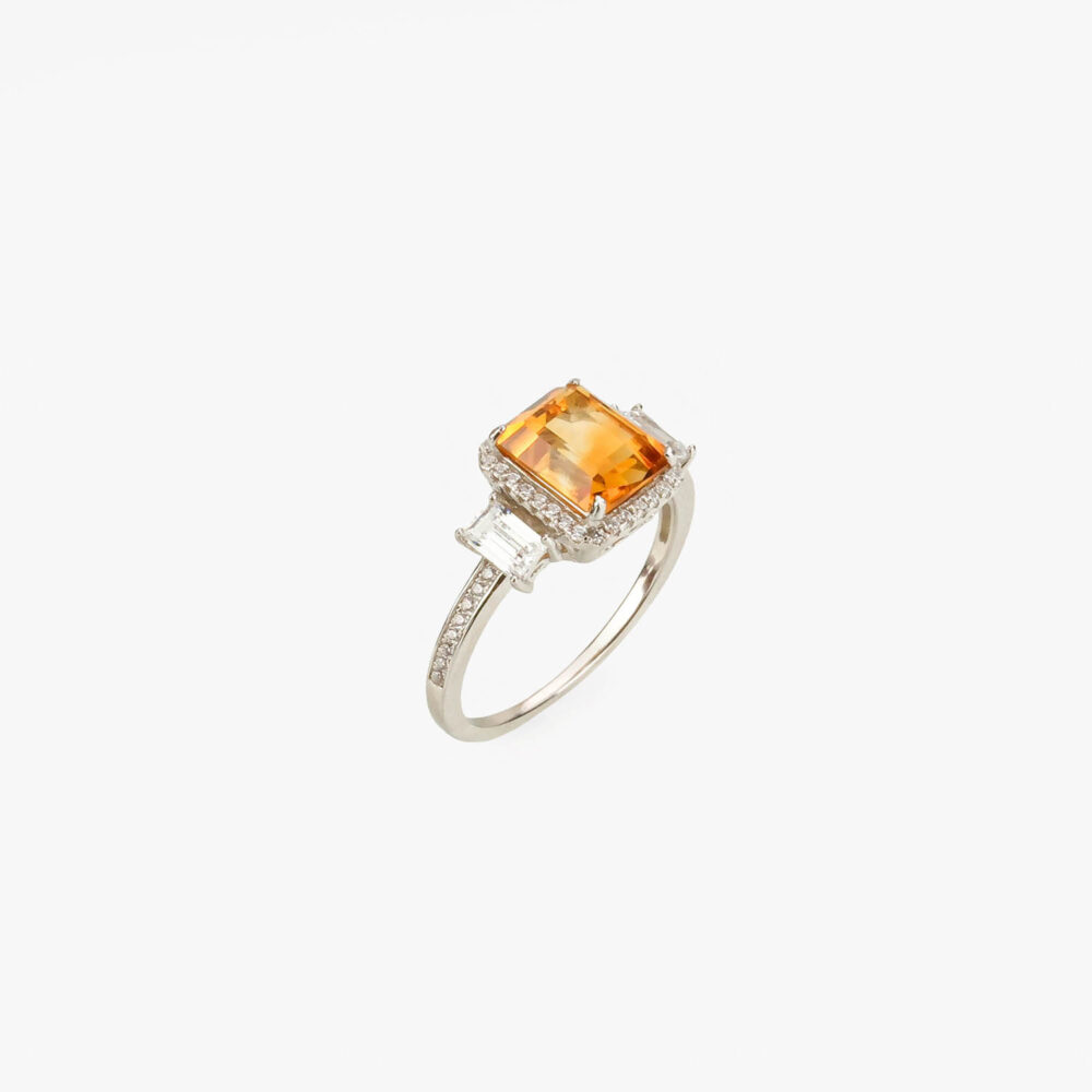 Elegant citrine sterling silver ring styled on model.