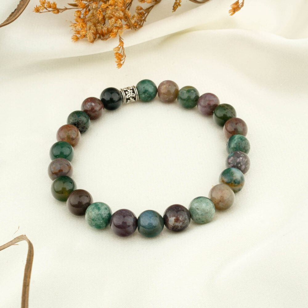 Moss agate 8mm natural stone beaded bracelet on neutral fabric