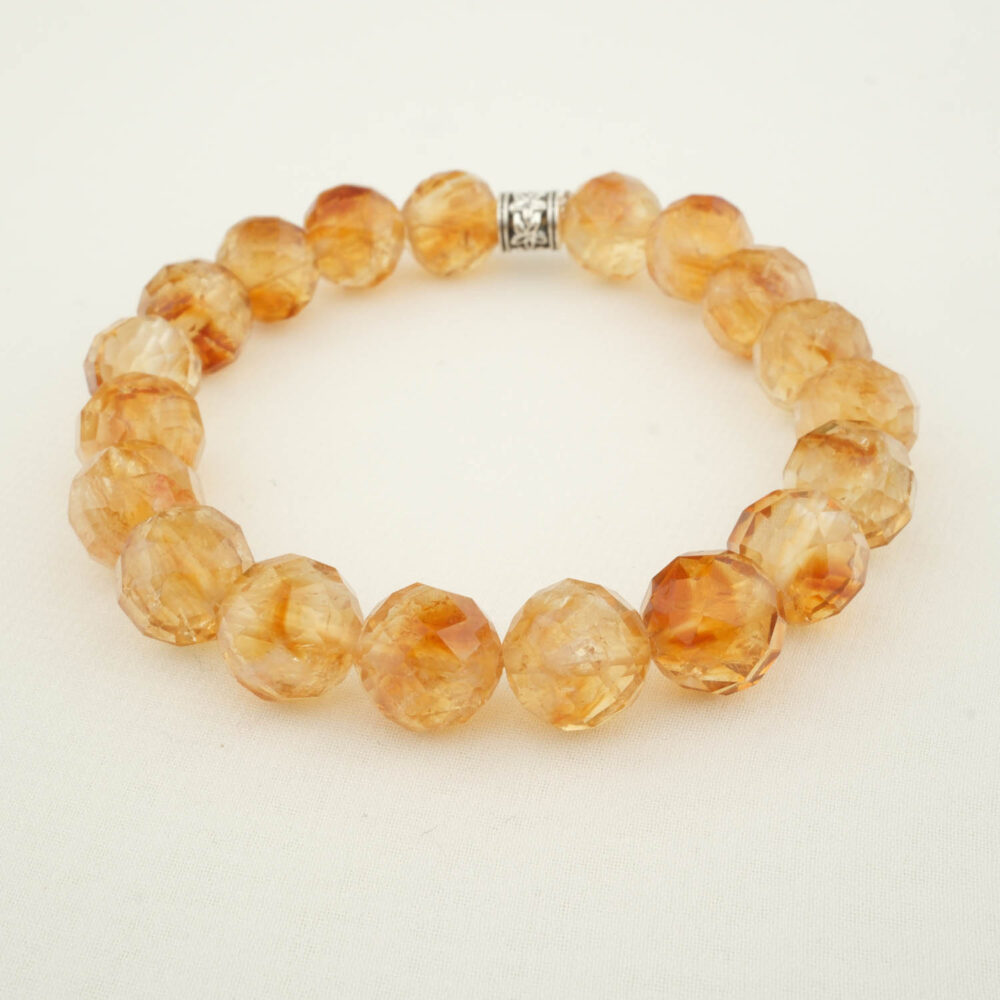 Pulsera de citrino con cuentas facetadas 11–12 mm 5A+ en elástico, con separador plateado