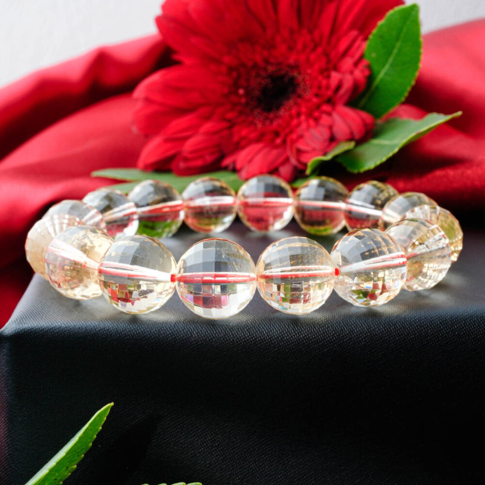 Pulsera de Citrino Ultra Claro 7A+ (11-12mm) con cuentas grandes, facetadas, de color amarillo claro brillando.