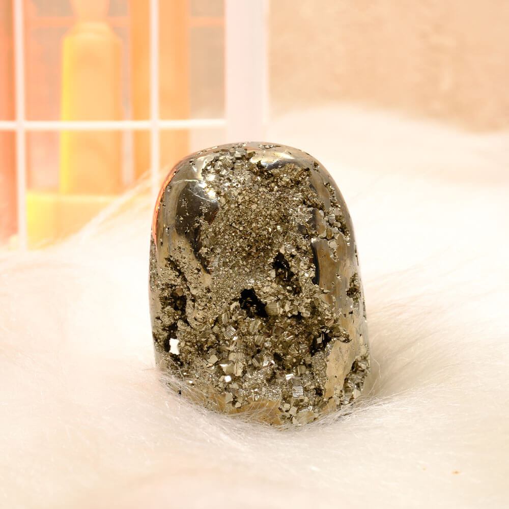 EN: Raw pyrite crystal specimen with metallic luster
