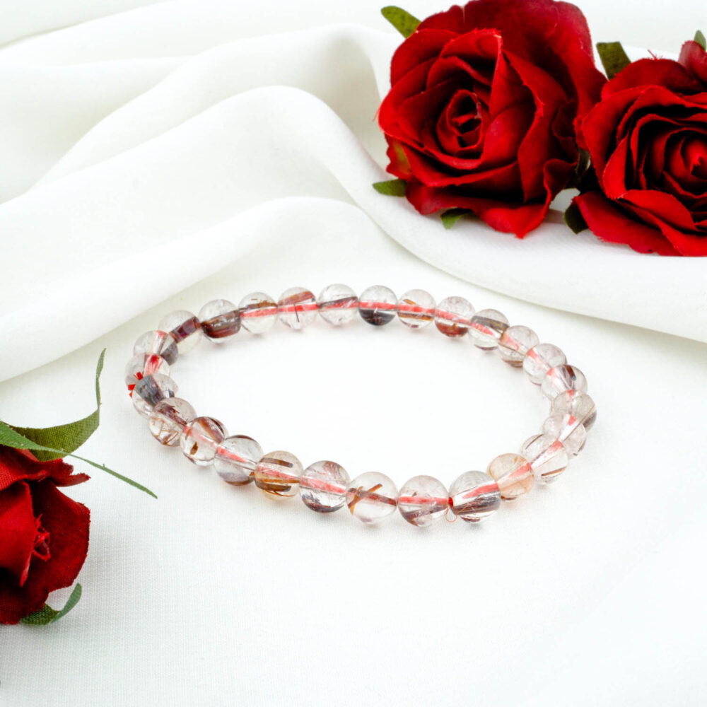 5A+ quality red rutilated quartz bracelet with 9-10mm beads on white