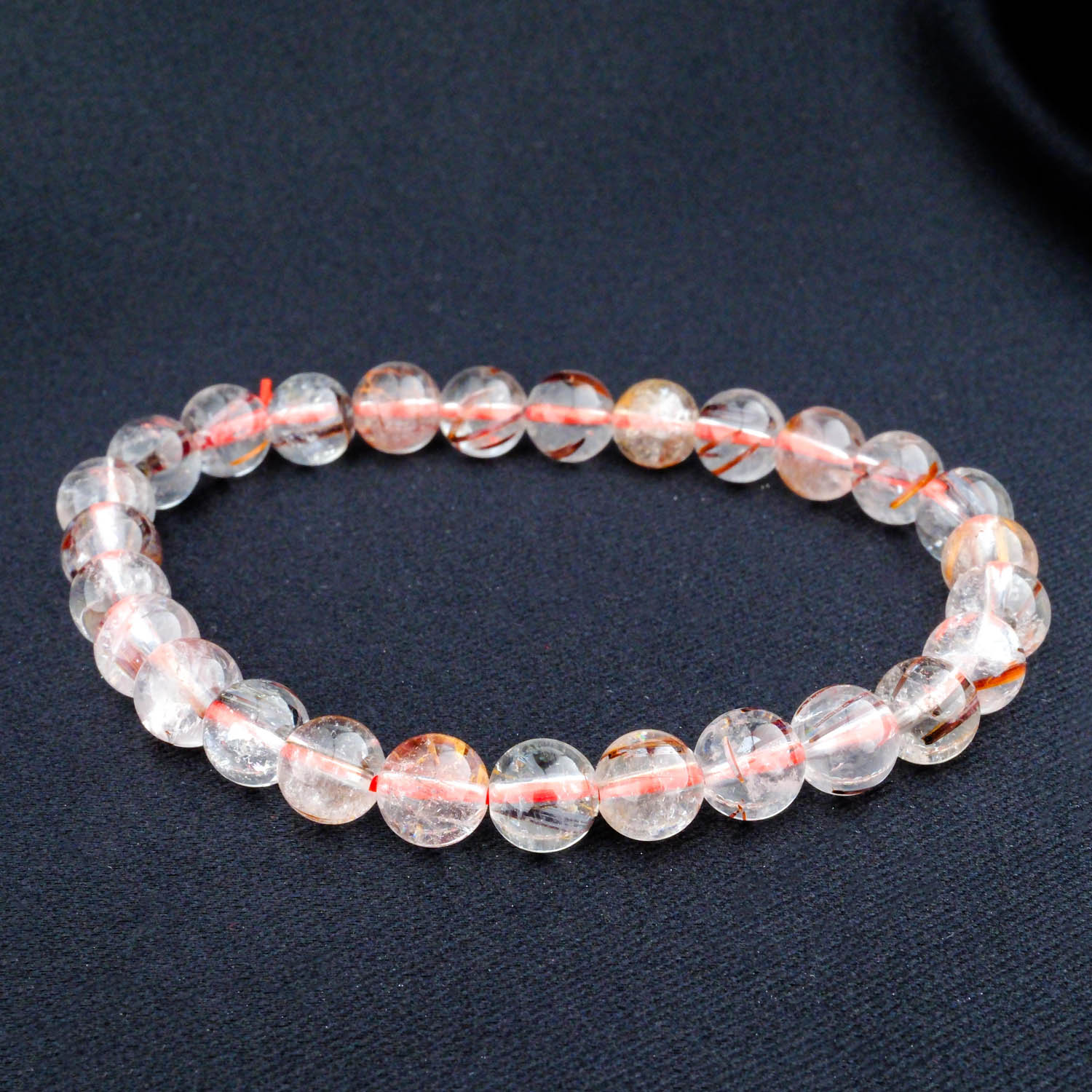 5a-roter-rutilquarz-armband-10mm 5A+ Qualität Roter Rutilquarz Armband mit 9-10mm Perlen auf weißem Display