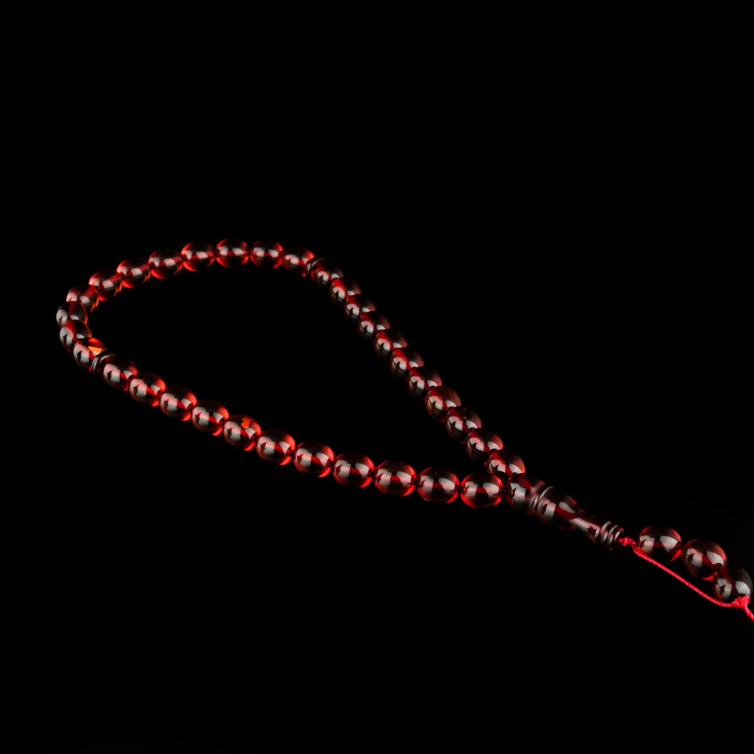 bernstein-tesbih-zertifiziert-925-silber Zertifizierter Bernstein-Tesbih (Gebetskette) mit 7.5x9mm Perlen auf weißem Display