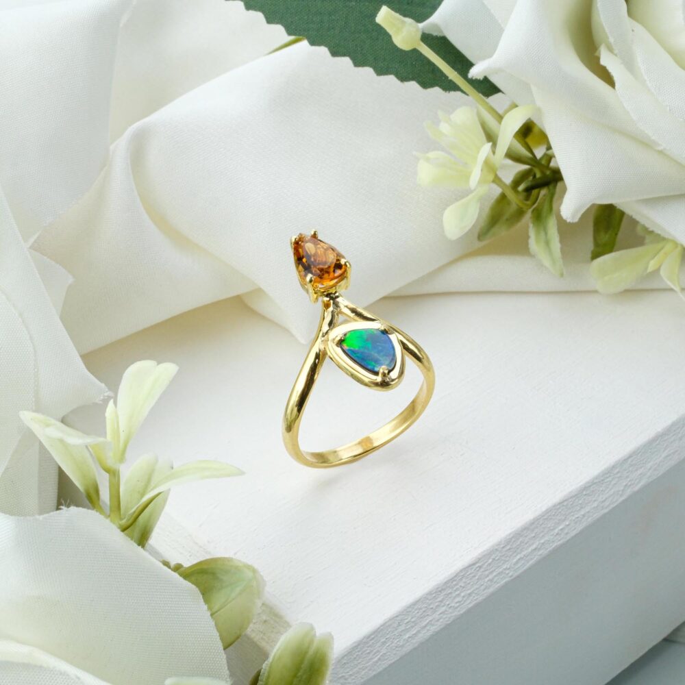 Genuine Boulder Opal ring with Citrine accents in gold-plated 925 sterling silver on white