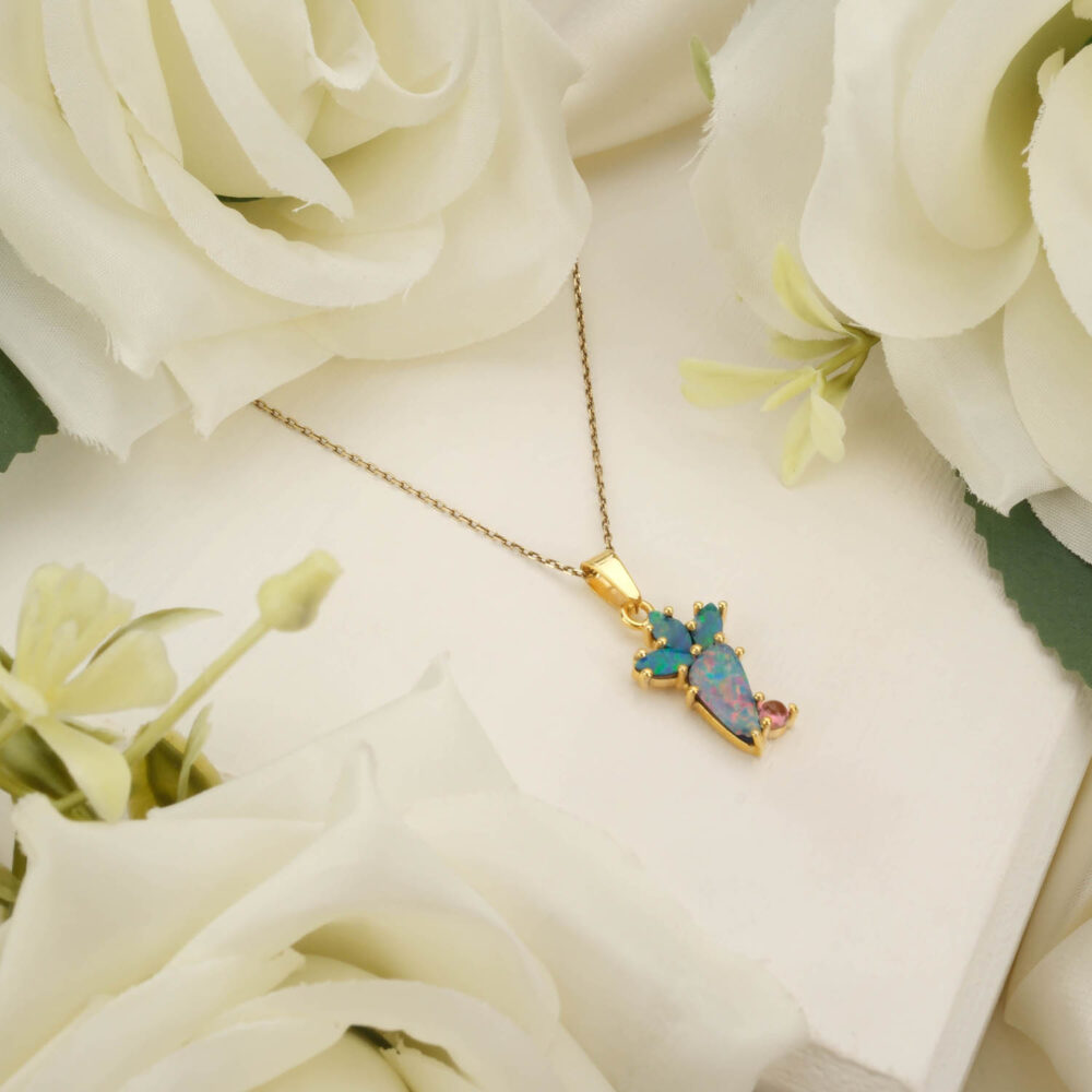 Multi-colored Australian Boulder Opal and Tourmaline beaded necklace with gold-plated clasp on white