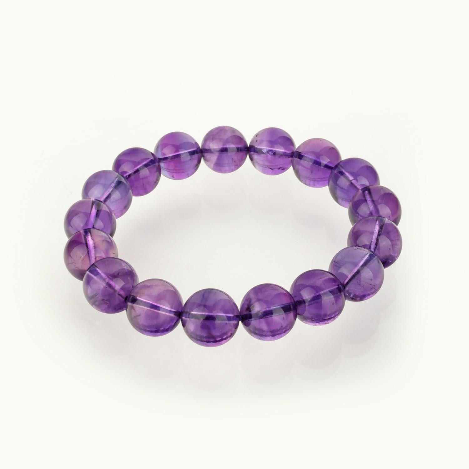 bracelet-amethyste-vip-10a-perles-12mm Bracelet en améthyste qualité VIP 10A+ avec perles violettes 11-12mm sur fond blanc
