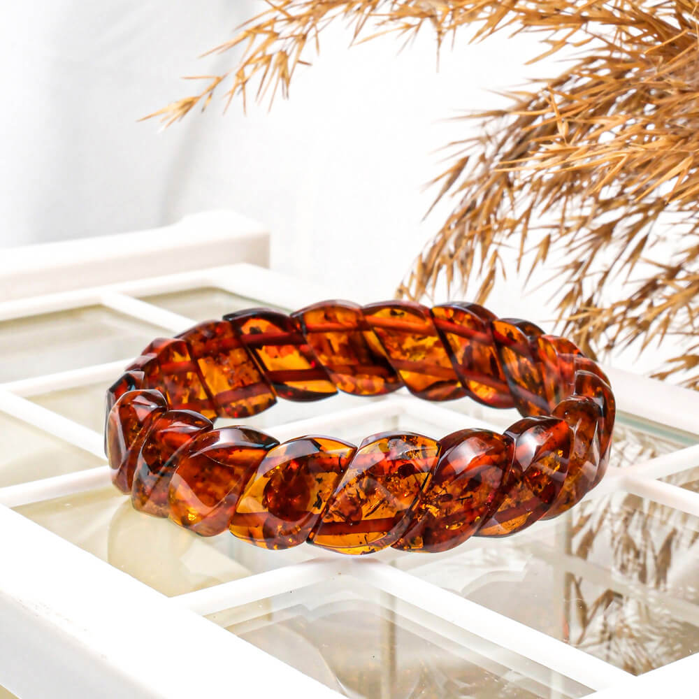 Certified Baltic amber bracelet for adults with large 18-19mm faceted "Rolex" style links in cognac color.