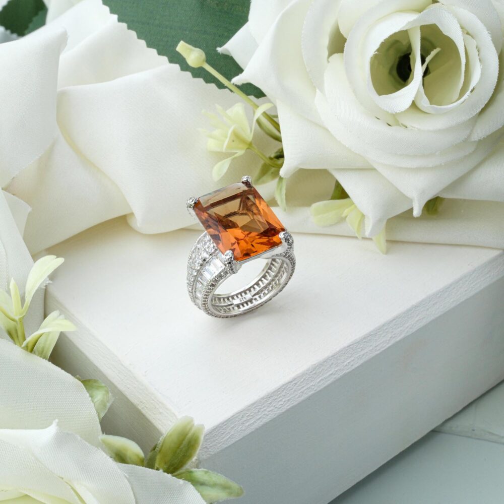 Large emerald-cut Zultanite ring in 925 sterling silver with baguette zircon band on white