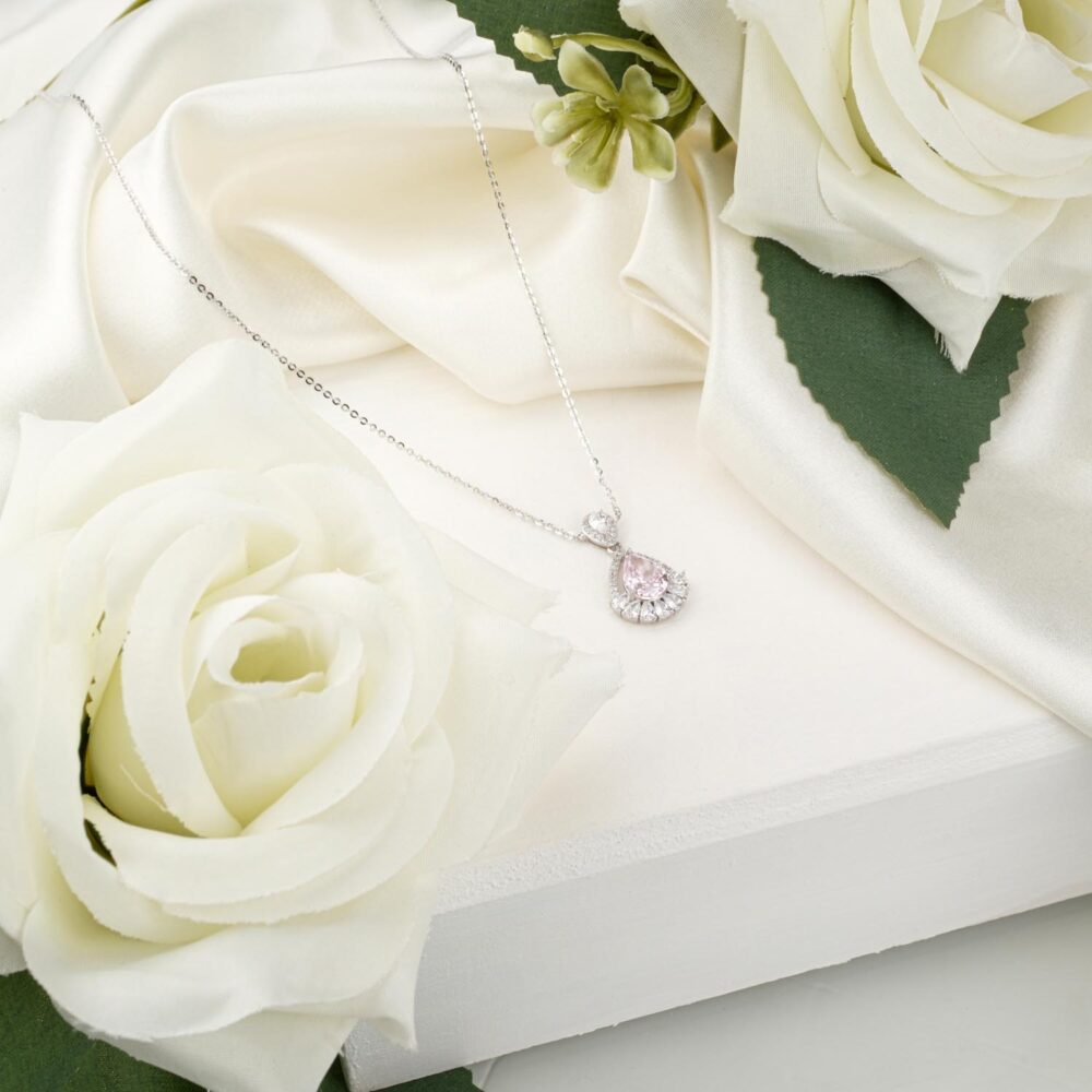 Certified "Ice Cut" teardrop pink zircon pendant necklace in 925 sterling silver on white