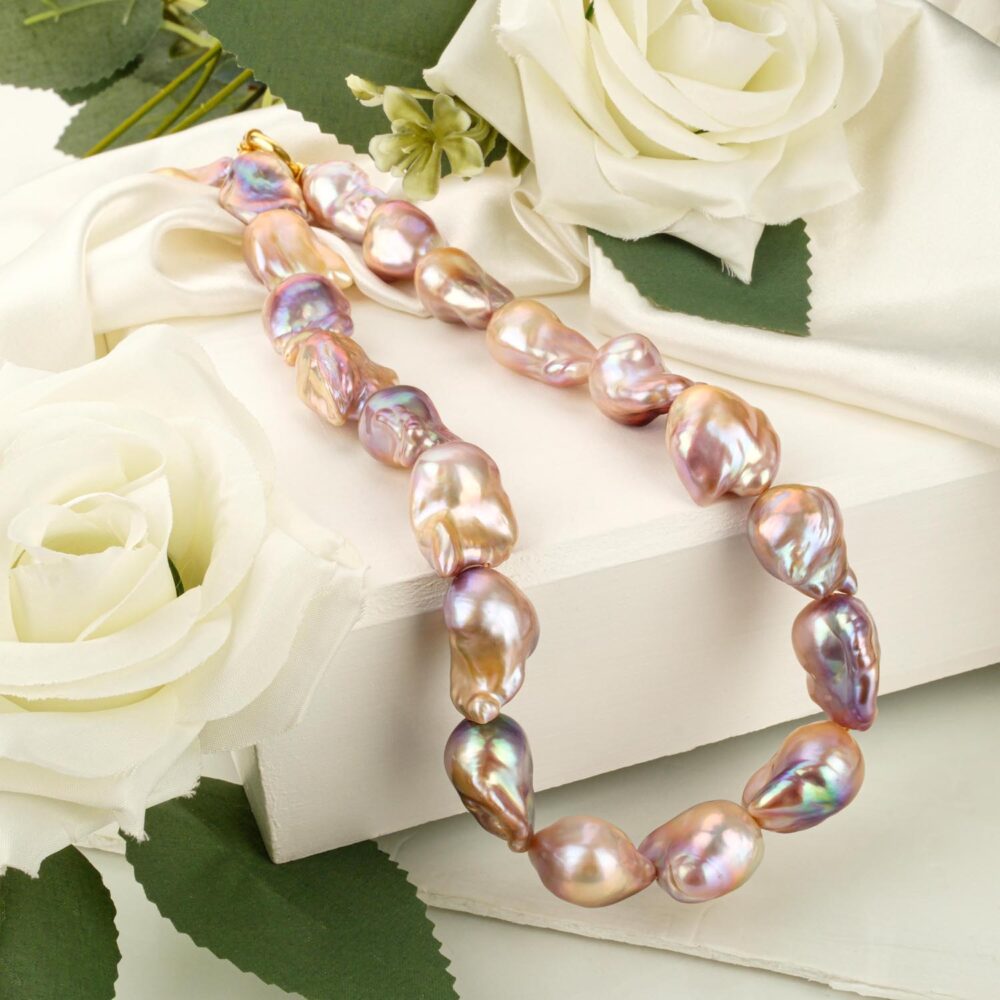 A+ quality large rose baroque pearl necklace with gold-plated 925 silver clasp on white
