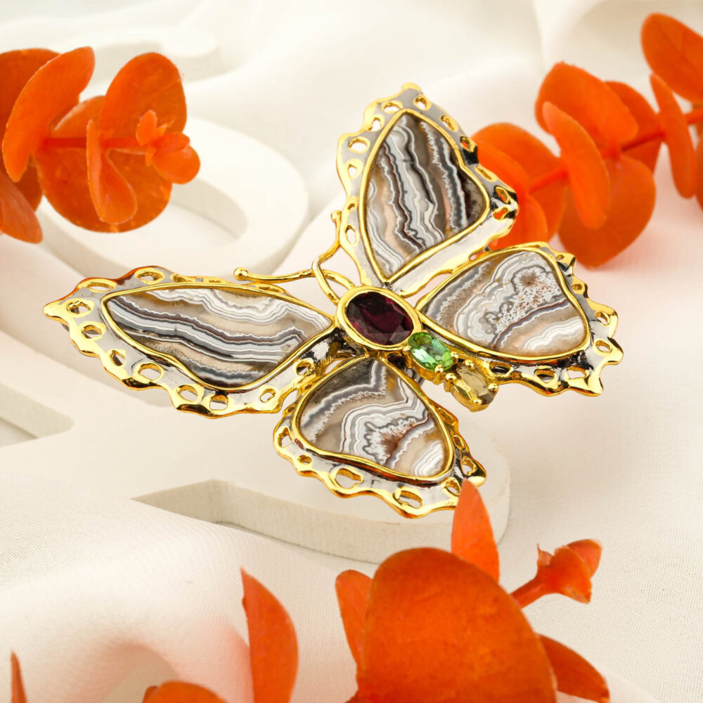 Gold-plated silver ring designed as a butterfly with agate wings and citrine peridot body accents