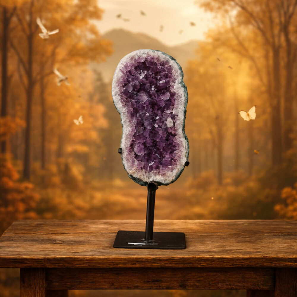 Tall natural amethyst geode with deep purple crystals standing vertically