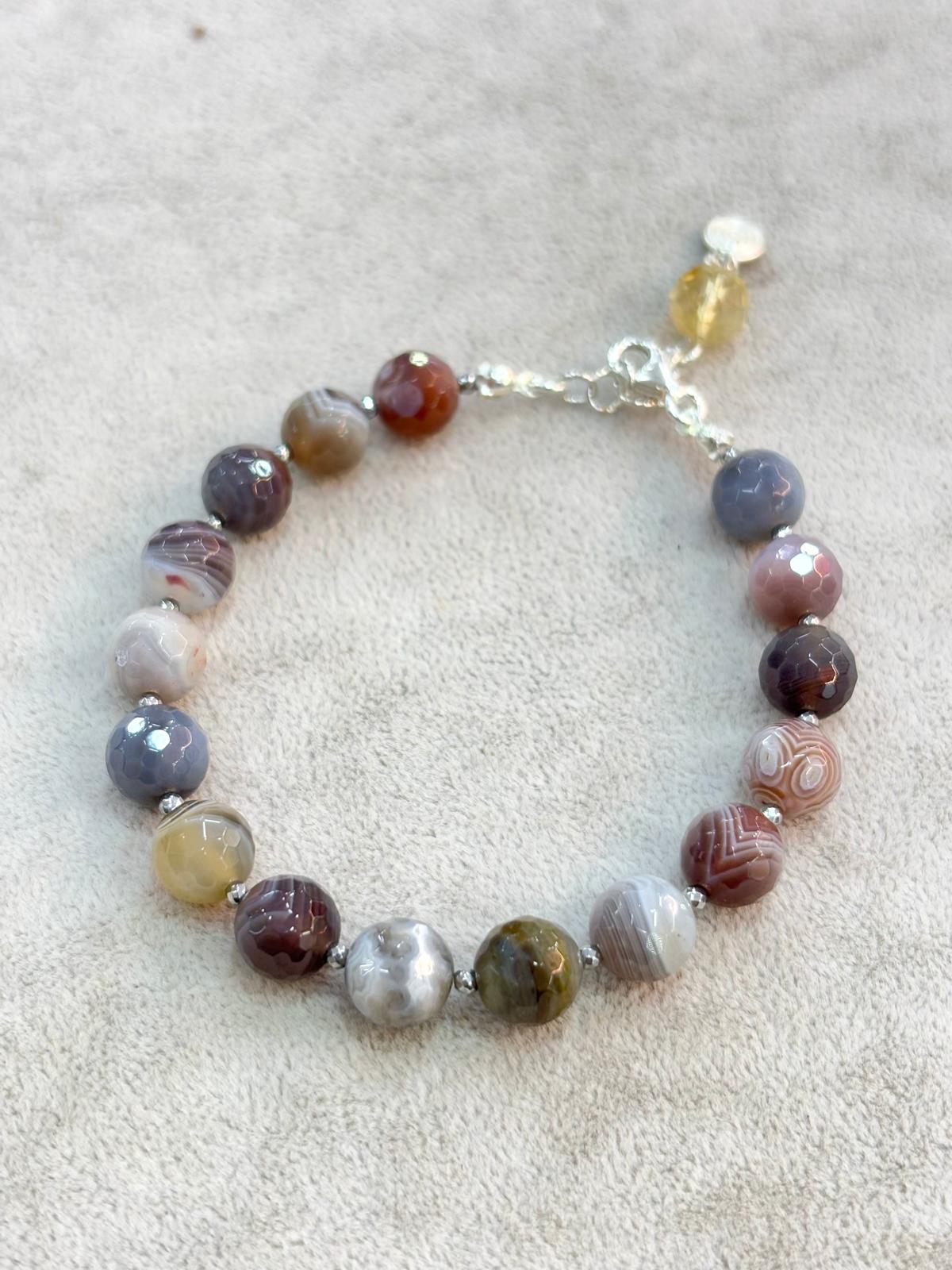 Natural faceted multi color agate beaded bracelet with grey brown and red beads and silver clasp