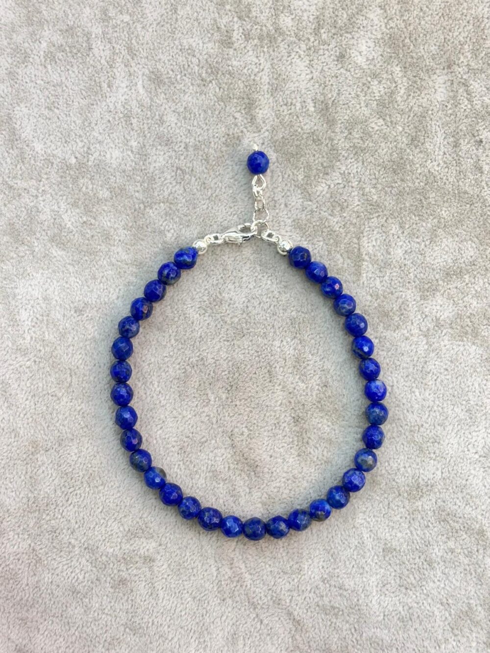 Natural faceted round blue lapis lazuli beaded bracelet with sterling silver clasp