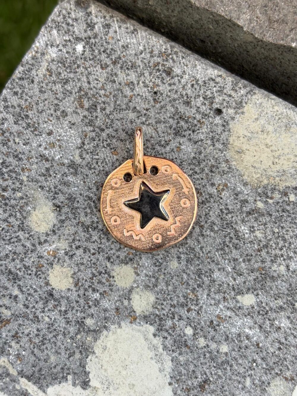 Textured rose gold plated sterling silver round coin pendant with cutout star symbol