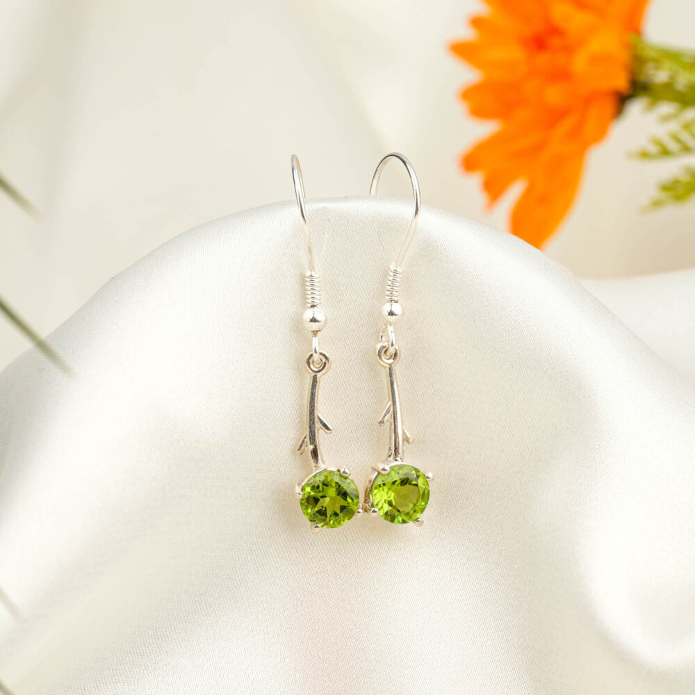 925 sterling silver dangle drop earrings featuring a delicate branch design and natural round green peridot gemstones